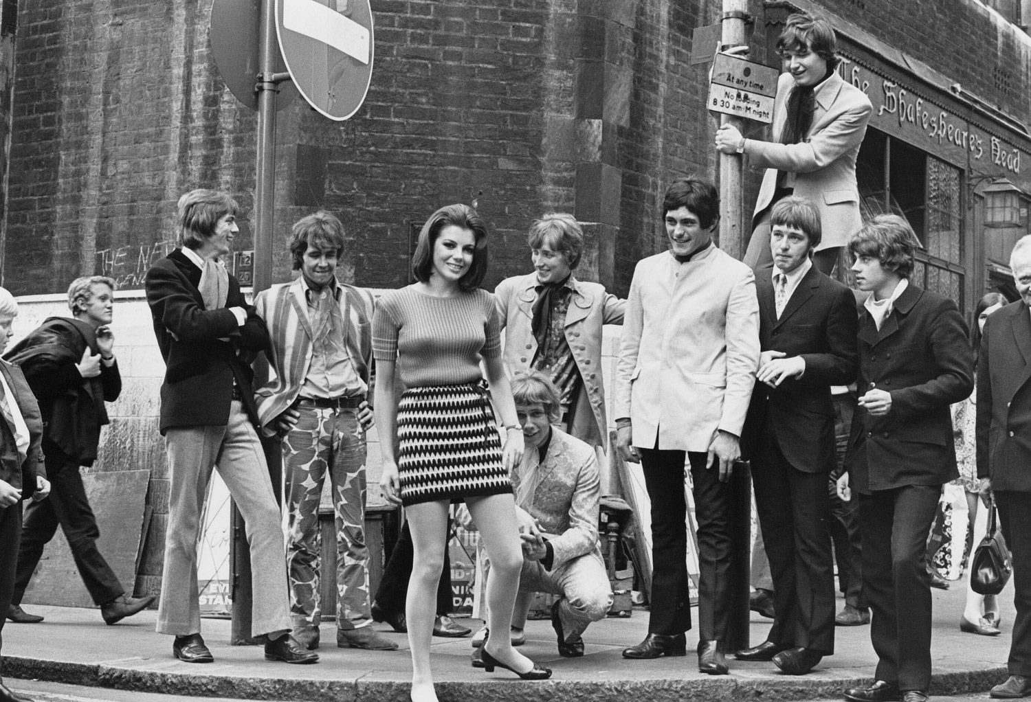 Some cool looking dudes and hippy chicks in Carnaby street circa 1967.