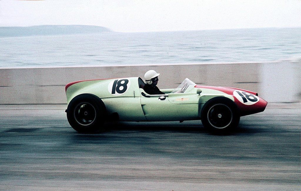 A vintage racing car in action.