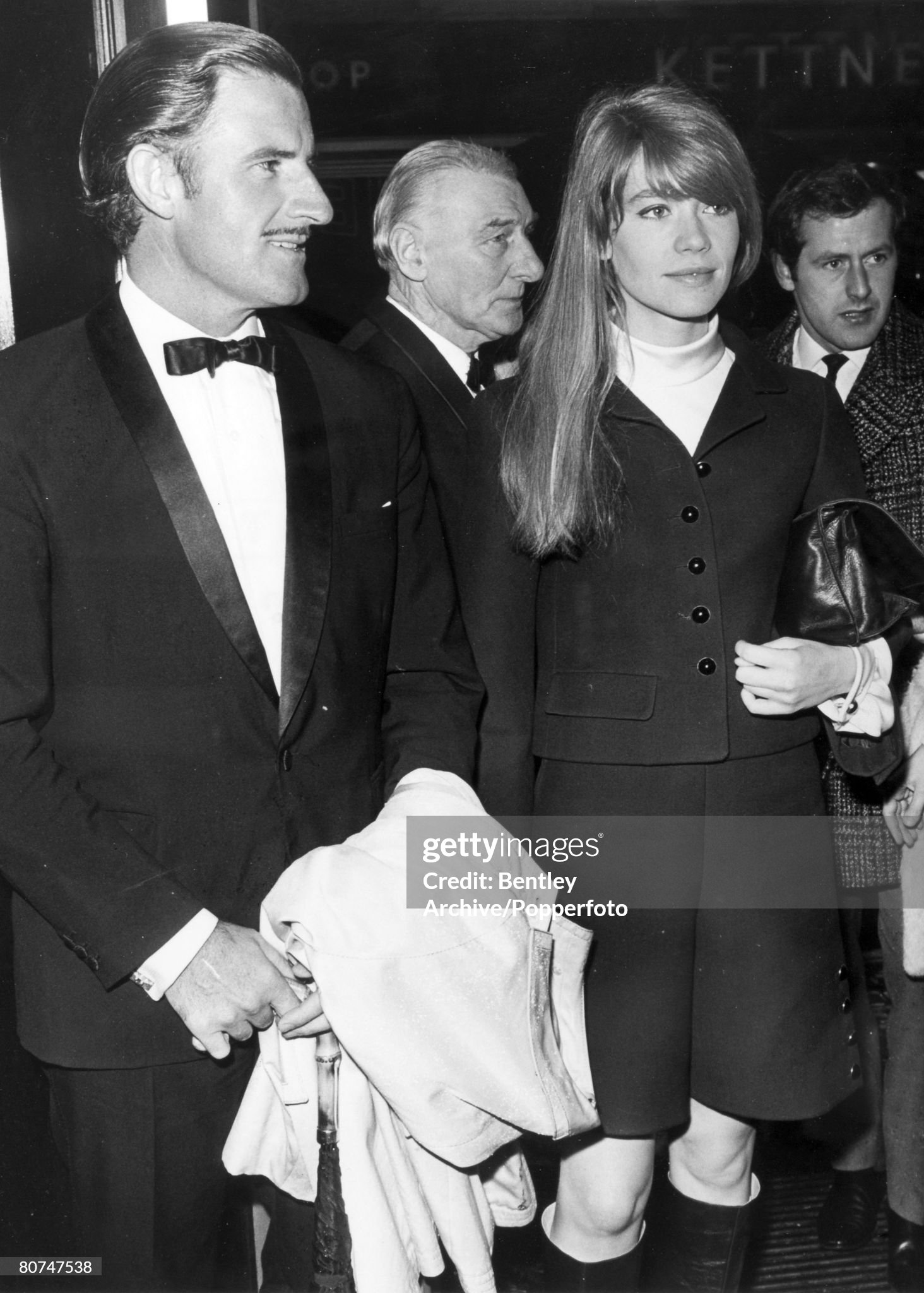 10th March 1967, London. British driver Graham Hill pictured with French actress Françoise Hardy at the premiere of the film Grand Prix in which they both appear. 