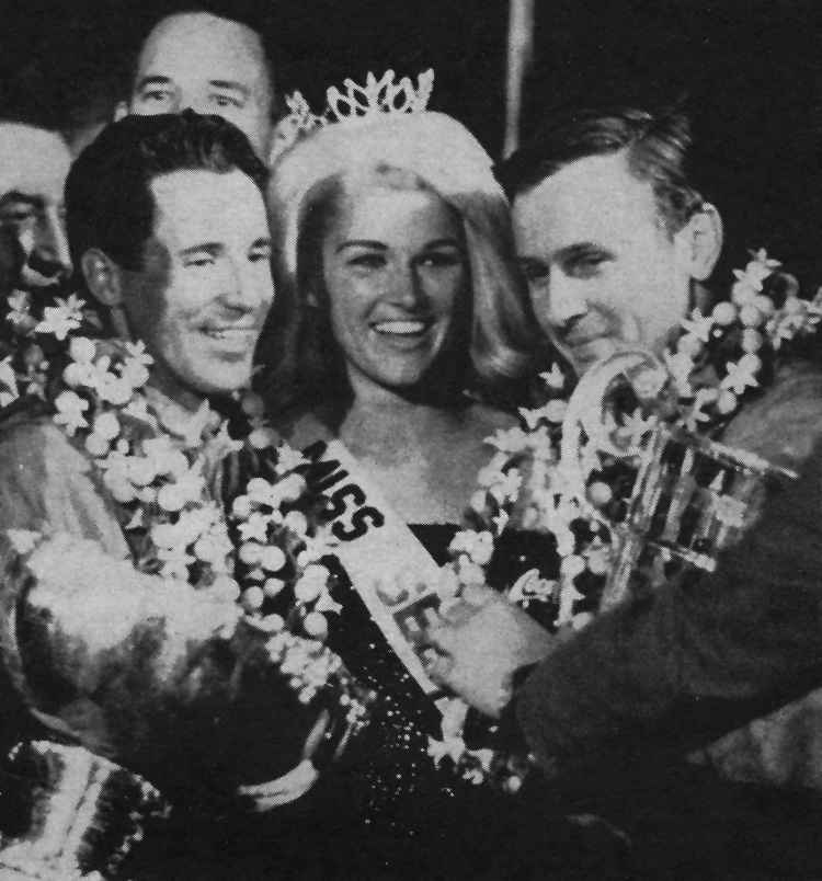 Mario Andretti and Bruce McLaren with a beauty queen at Sebring on 01 April 1967.