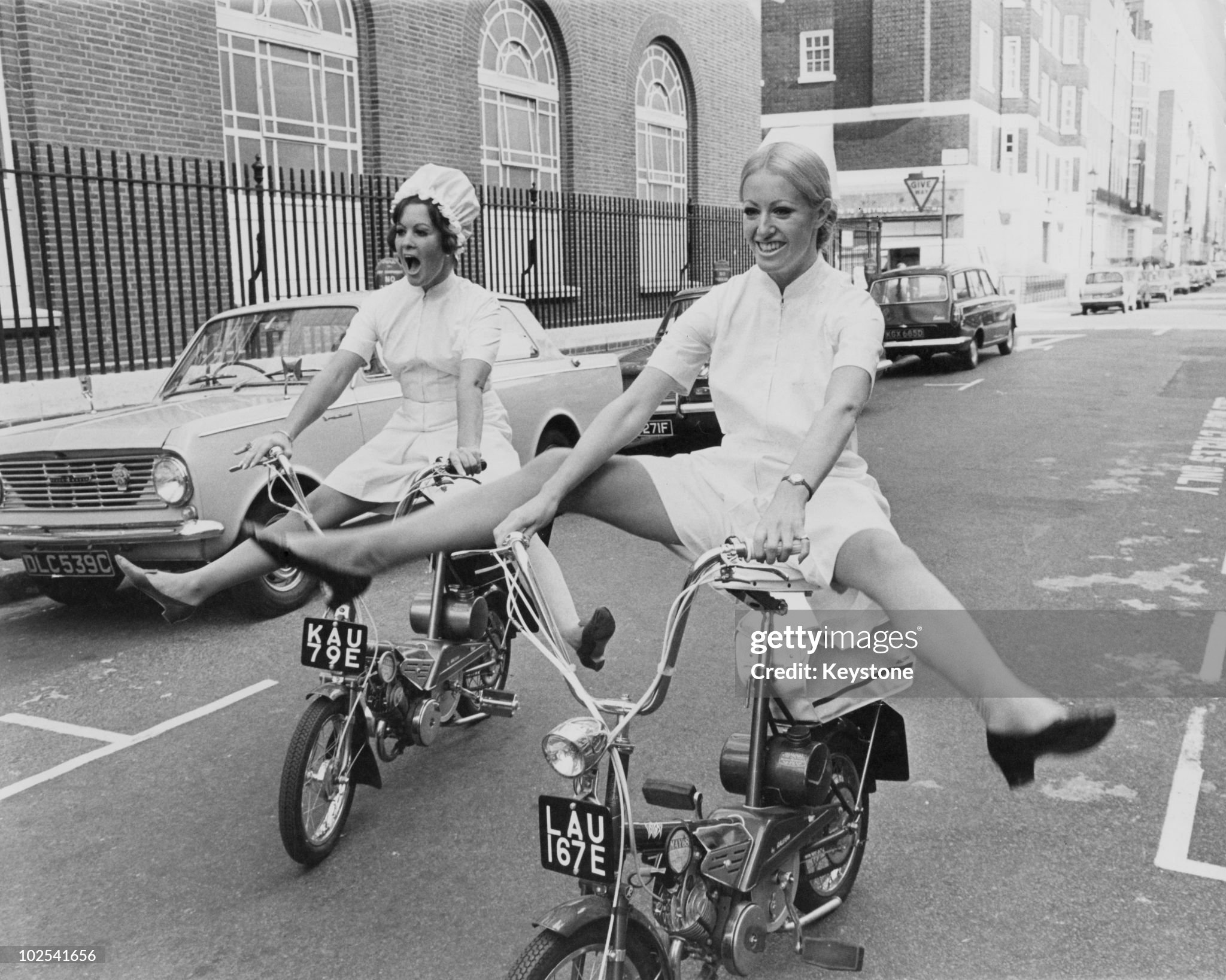 Models Glenda Warrington (left) and Caroline Whineray demonstrate the extra freedom and mobility afforded by the latest culotte dresses for nurses, 16th October 1967. 