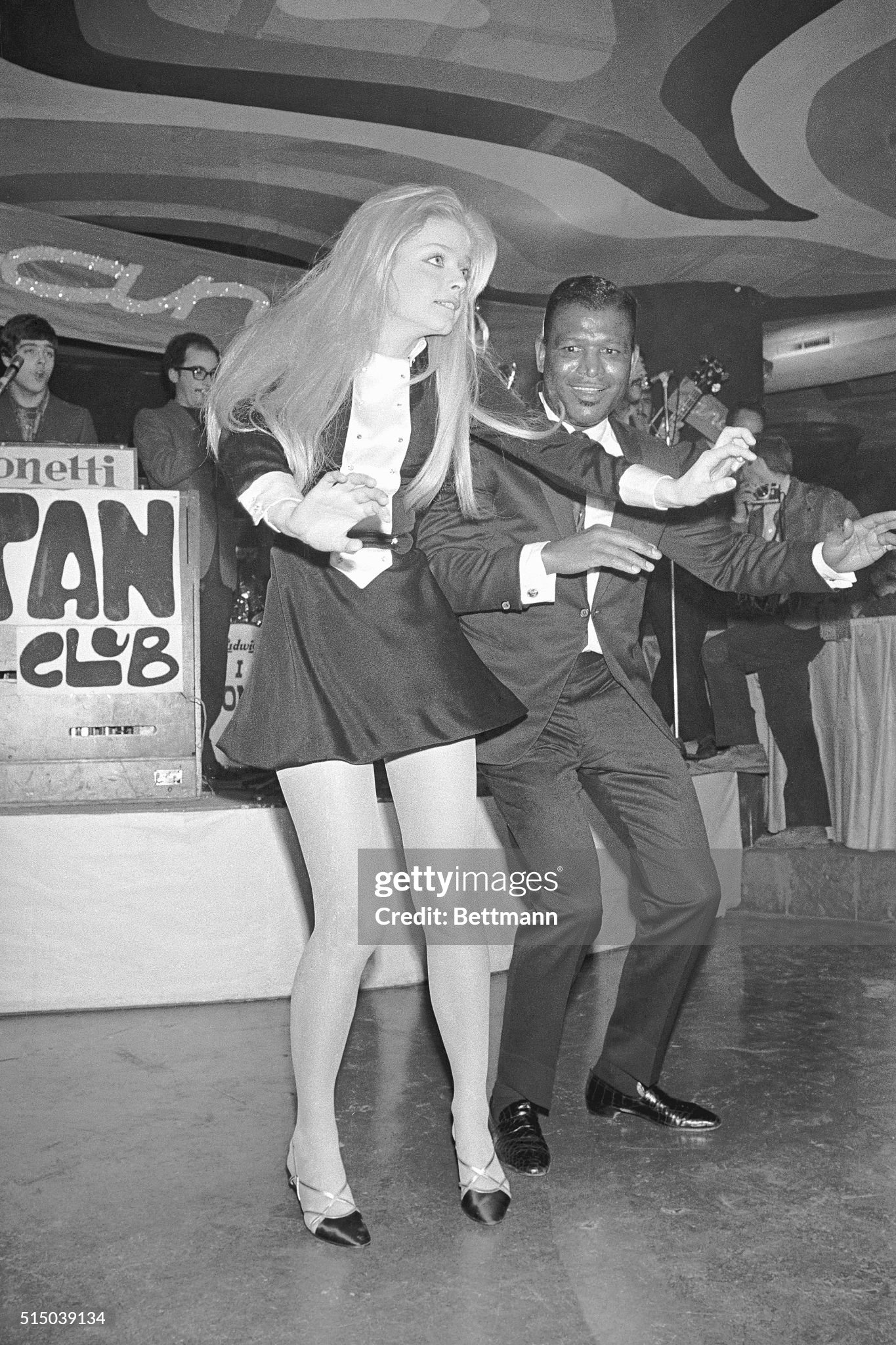 Former middleweight and welterweight boxing champ Sugar Ray Robinson does a dance routine with teenage Swedish actress Ewa Aulin in Rome, Italy, on 13 December 1967. 