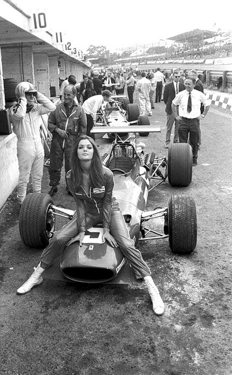 Chris Amon, Ferrari 312 242C - 3.0 V12 and a girl at the British GP in Brands Hatch on 20 July 1968.