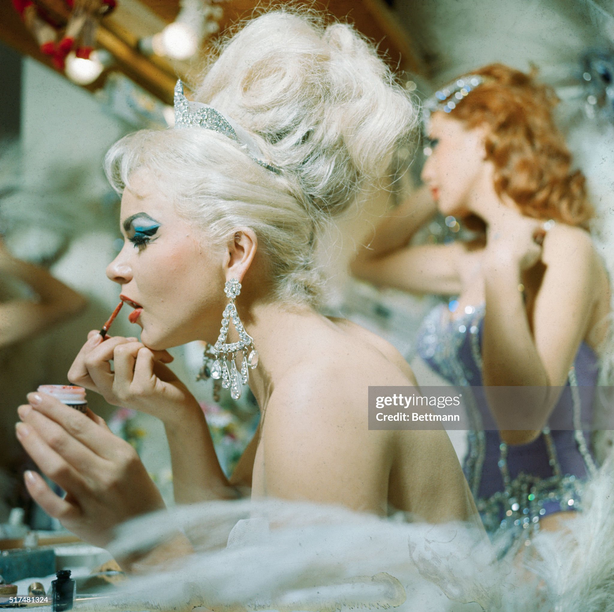 Tropicana dancers dress for a show in 1969 celebrating the centennial of the original Folies Bergere, which opened in Paris in 1869. The show's Las Vegas incarnation has been running since 1961. 