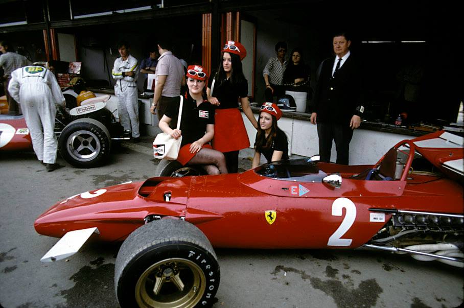 Three grid girls and Jacky Ickx’s Ferrari 312B at the Spanish GP in Jarama on April 19, 1970.