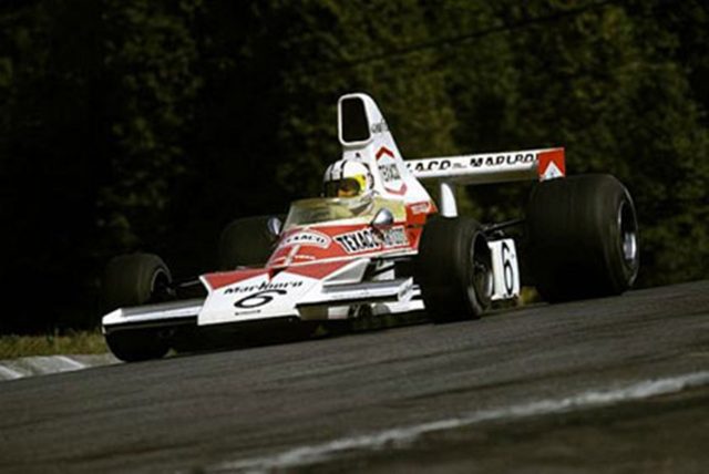 Denny Hulme, McLaren M23 Ford, in 1974.