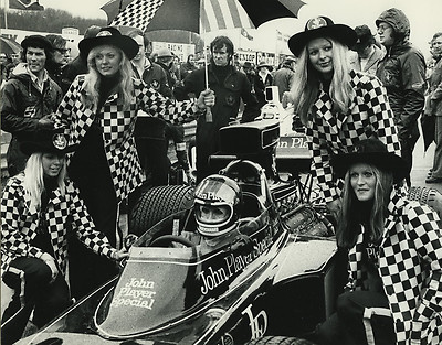 Jacky Ickx with JPS girls on the grid at Brands Hatch on 20 July 1974. 
