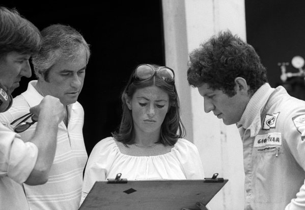 Ken Tyrrell with Roger Penske, Pam Scheckter (RSA) and her husband Jody Scheckter (RSA) at the Brazilian Grand Prix in Interlagos, Sao Paulo, on 26 January 1975. 