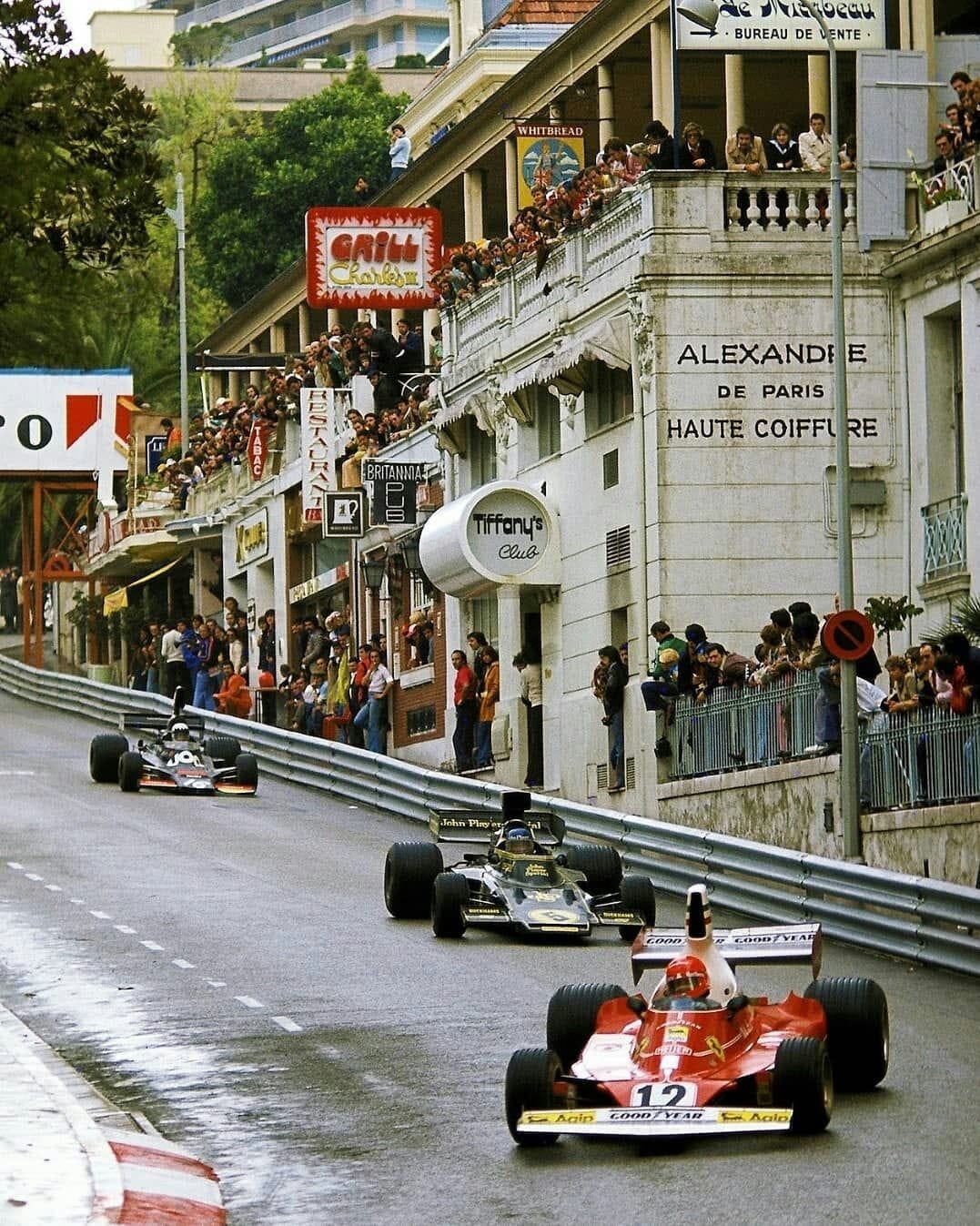 Niki Lauda, Ferrari, Ronnie Peterson, Lotus 72, Tom Pryce, Shadow, at the Monaco Grand Prix on 11 May 1975.