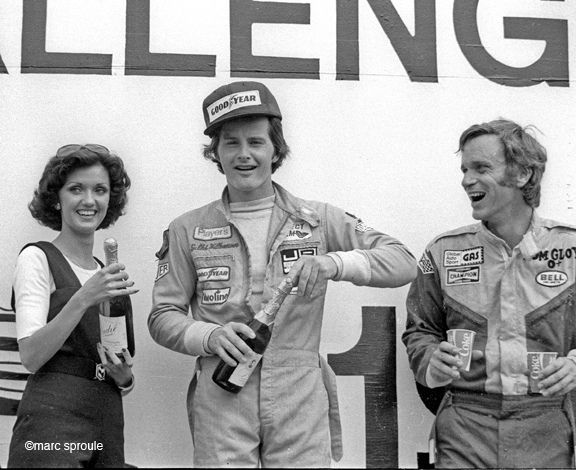 Gilles Villeneuve and Tom Gloy on the victory stand. Villeneuve won, Gloy was second. Formula Atlantic 1976.