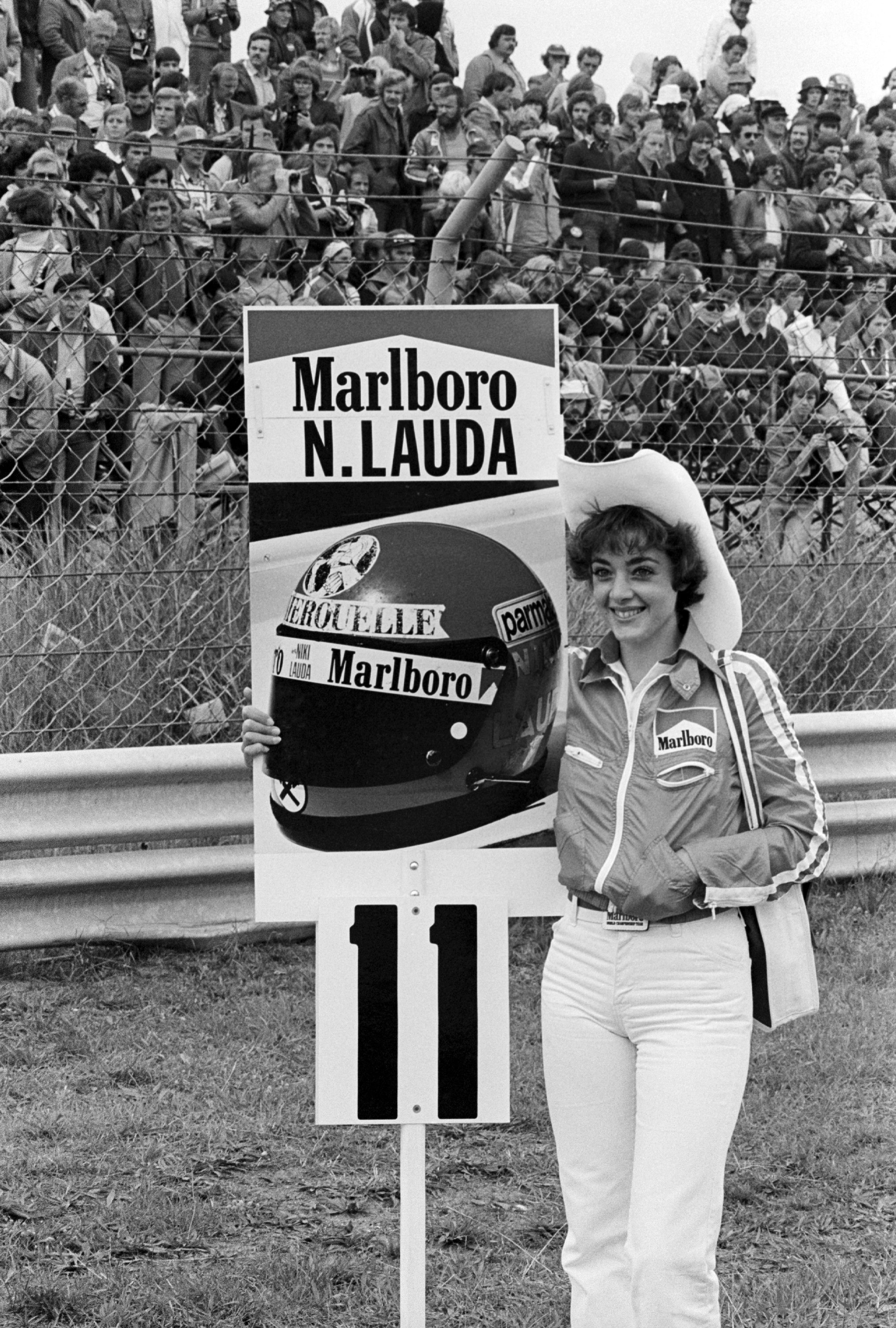 A Marlboro grid girl for race winner Niki Lauda, Ferrari, in 1977.