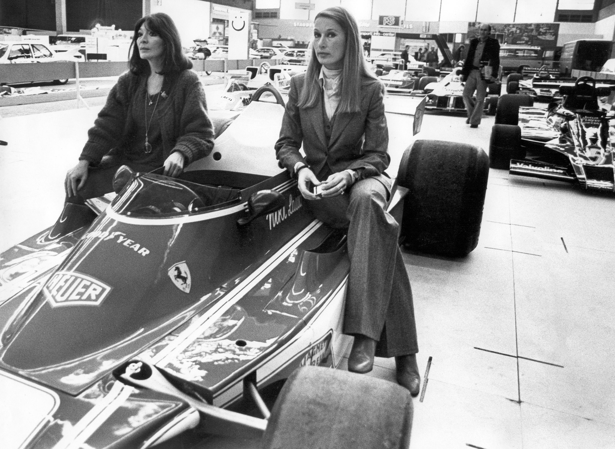 Juliette Greco and Nina Rindt with Niki Lauda's 1977 Ferrari.