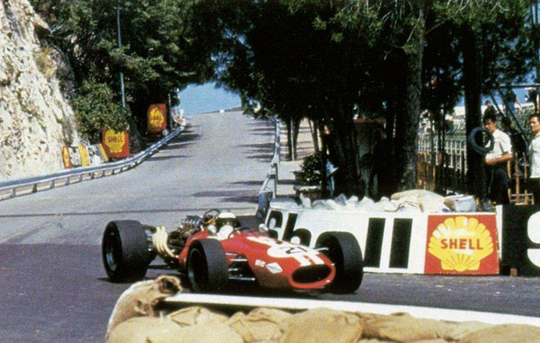 A vintage car racing in Monaco.