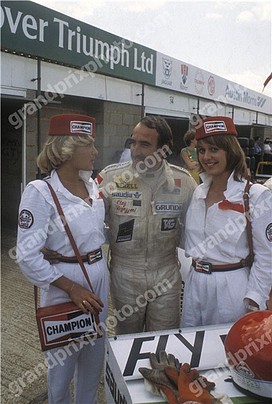 Clay Regazzoni with two Champion promoters in 1979.