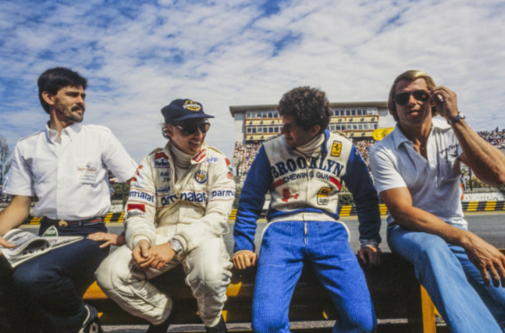Niki Lauda and Jody Scheckter sit together on the pit wall, Brabham designer Gordon Murray is seated on the left, at the Argentinean Grand Prix in Buenos Aires on 21 January 1979. 