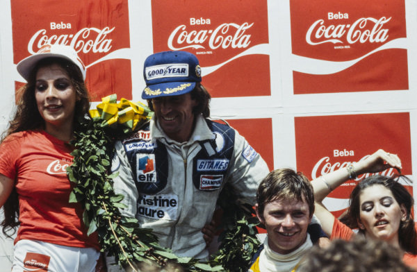 Jacques Laffite on the podium at the Brazilian Grand Prix in Interlagos, Sao Paulo, on 04 February 1979.