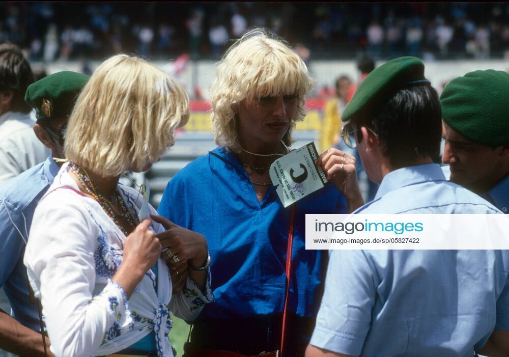 Pit girls show their accreditations to the Gendarmerie at the France Grand Prix in Dijon – Prenois on 01 July 1979.