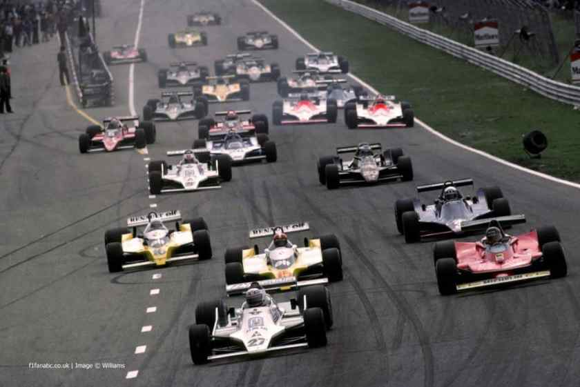Alan Jones leads Gilles Villeneuve and the Renaults into turn one as Carlos Reutemann loses a wheel at the Dutch Grand Prix in Zandvoort on 24 August 1979.