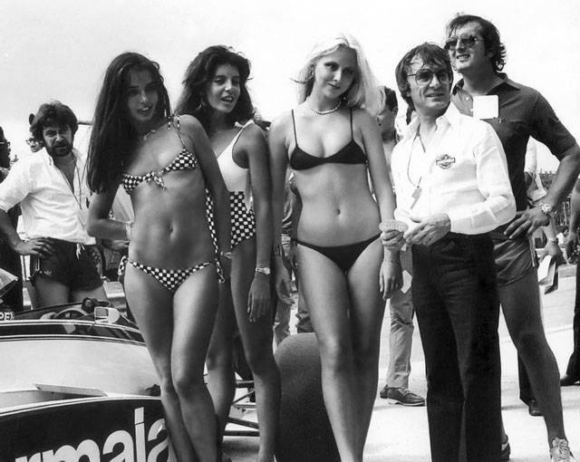 Bernie Ecclestone with some beautiful girls in bikinis at the 1981 Brazilian Grand Prix.