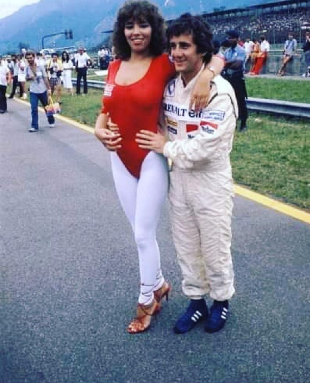 Alain Prost with a Giacobazzi Lambrusco girl at the Brazilian Grand Prix in Jacarepaguá, Rio de Janeiro, on 21 March 1982.