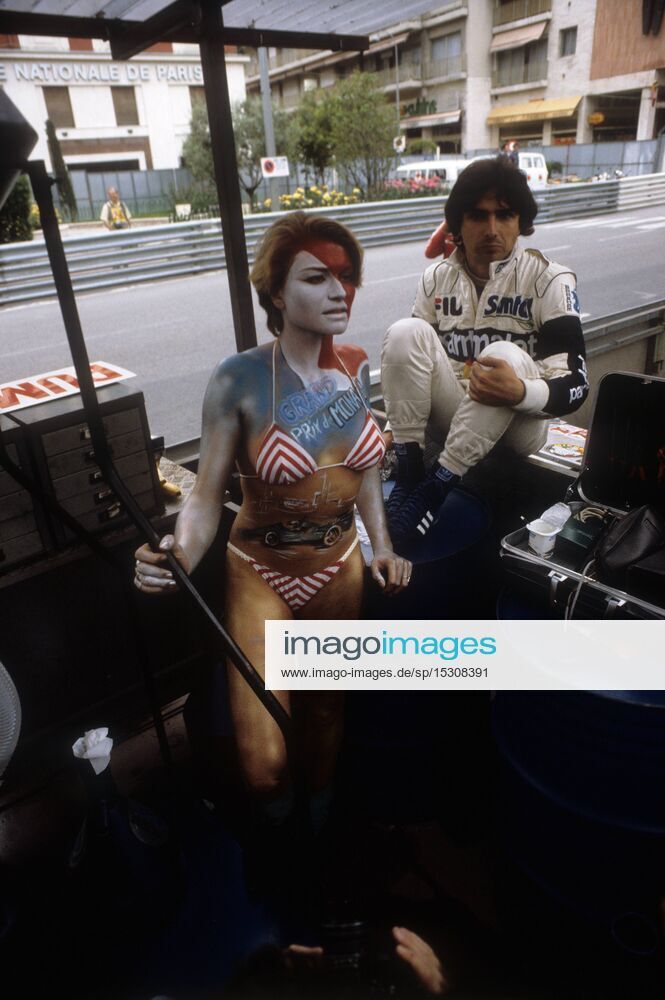 Nelson Piquet with a fan in a bikini at the Monaco Grand Prix in Monte Carlo circa 1982.
