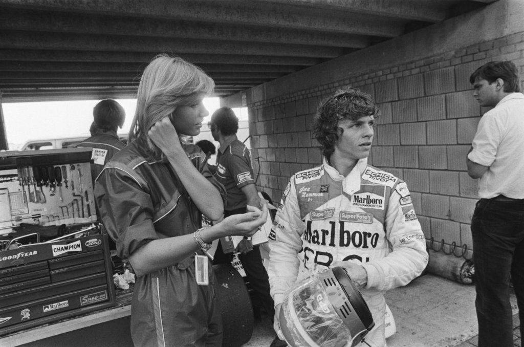 Jan Lammers with a girl at the Dutch Grand Prix at Zandvoort on 03 July 1982. 