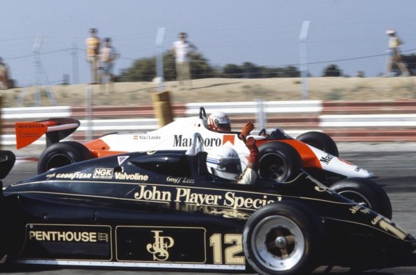 Geoff Lees, Lotus 91 Ford and Niki Lauda, McLaren MP4-1B Ford, signal at each other at the French Grand Prix in Paul Ricard on 25 July 1982. 