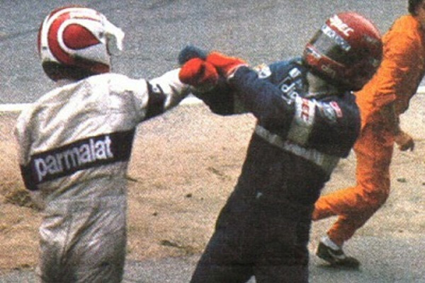 Nelson Piquet punches Eliseo Salazar during the German Grand Prix at Hockenheim on 08 August 1982.