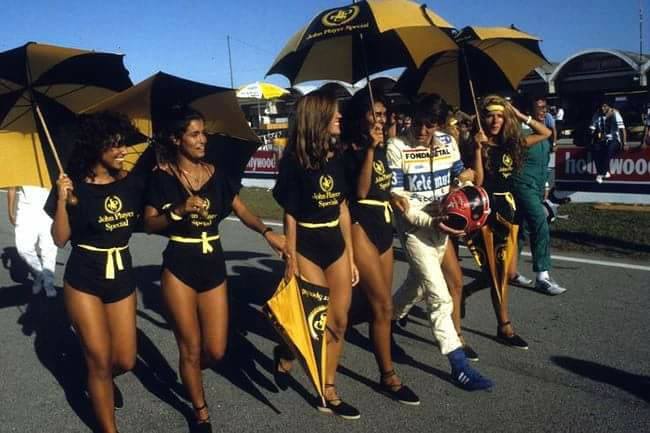 Piercarlo Ghinzani, Osella, with the JPS grid girls at the Brazilian Grand Prix in Jacarepagua on 13 March 1983.