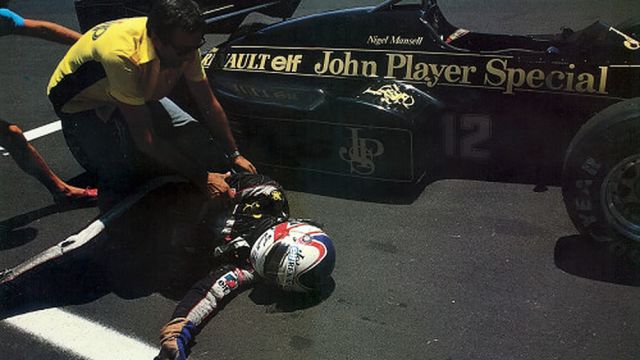 Nigel Mansell lying helpless on the asphalt at the US GP on 08 July 1984 at Fair Park in Dallas, Texas.