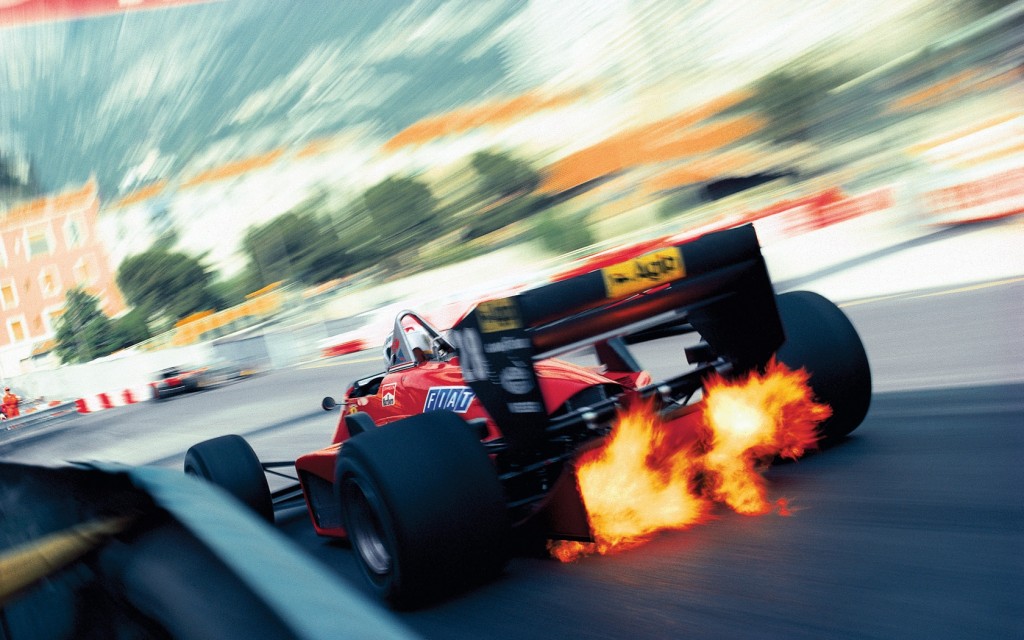 Exhaust flames shoot up through the diffuser of the Ferrari 156/85 of Stefan Johansson as he exits the Rascasse corner at the Monaco Grand Prix in Monte Carlo on 19 May 1985. 
