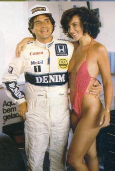 Nelson Piquet with a girl at the Brazilian Grand Prix in Jacarepaguá, Rio de Janeiro, on 23 March 1986.
