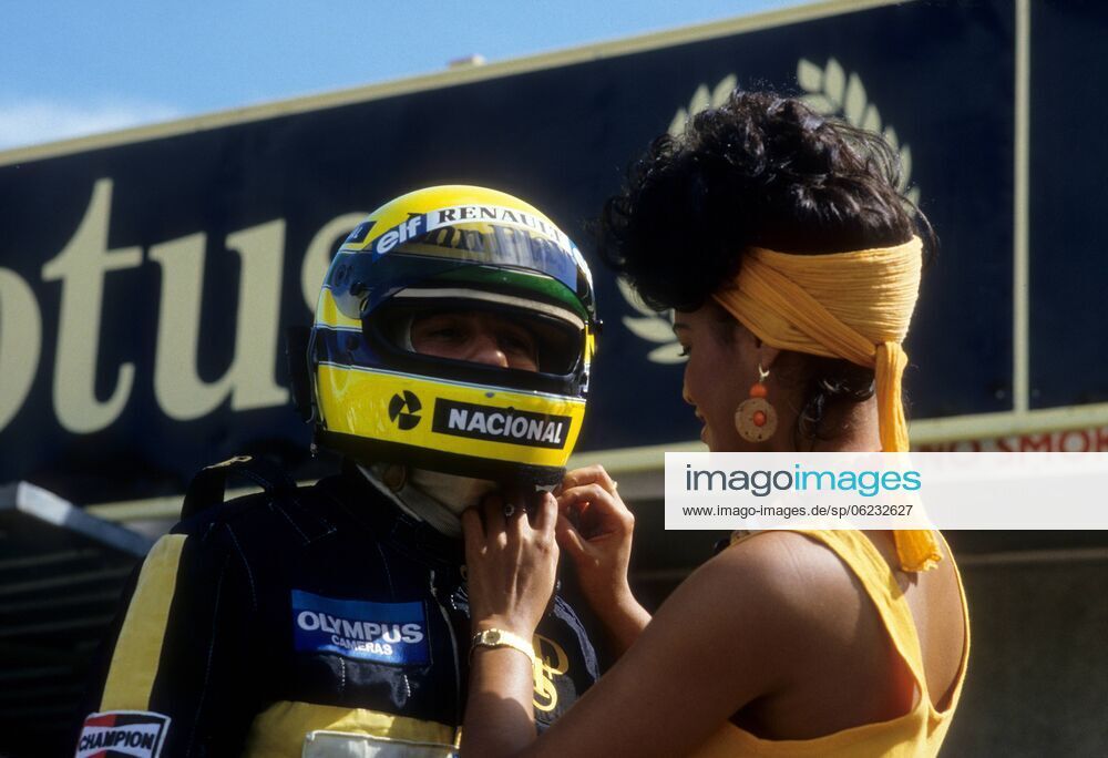 Ayrton Senna, Lotus Renault, with a girl.