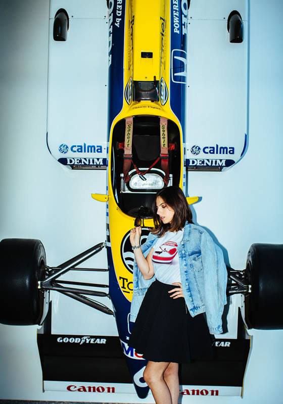 Kelly Piquet posing with the Williams FW11B Honda turbo V6 with which her father Nelson Piquet was three-time F1 world champion in 1987.