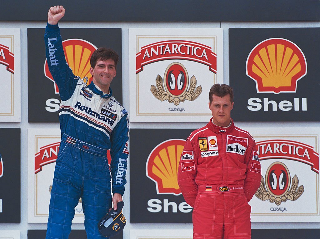 Damon Hill and Michael Schumacher share a podium at the Brazilian Grand Prix on 31st March 1996.