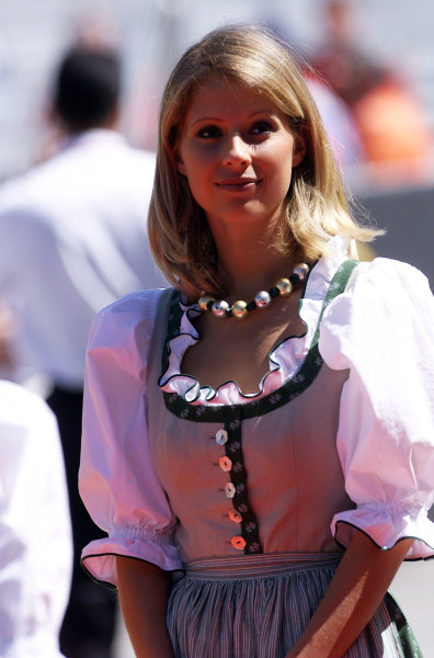 A grid girl in traditional costume at the Austrian Grand Prix in Zeltweg on 11-13 May 2001. 