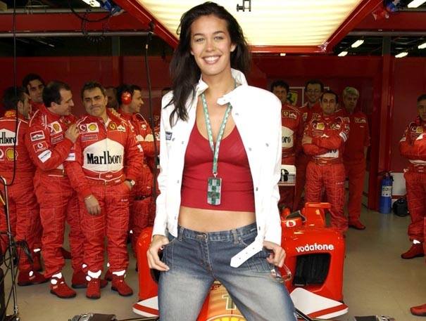 Model Megan Gale and Ferrari Team at the Australian Grand Prix at the Melbourne Grand Prix Circuit on 09 March 2003.