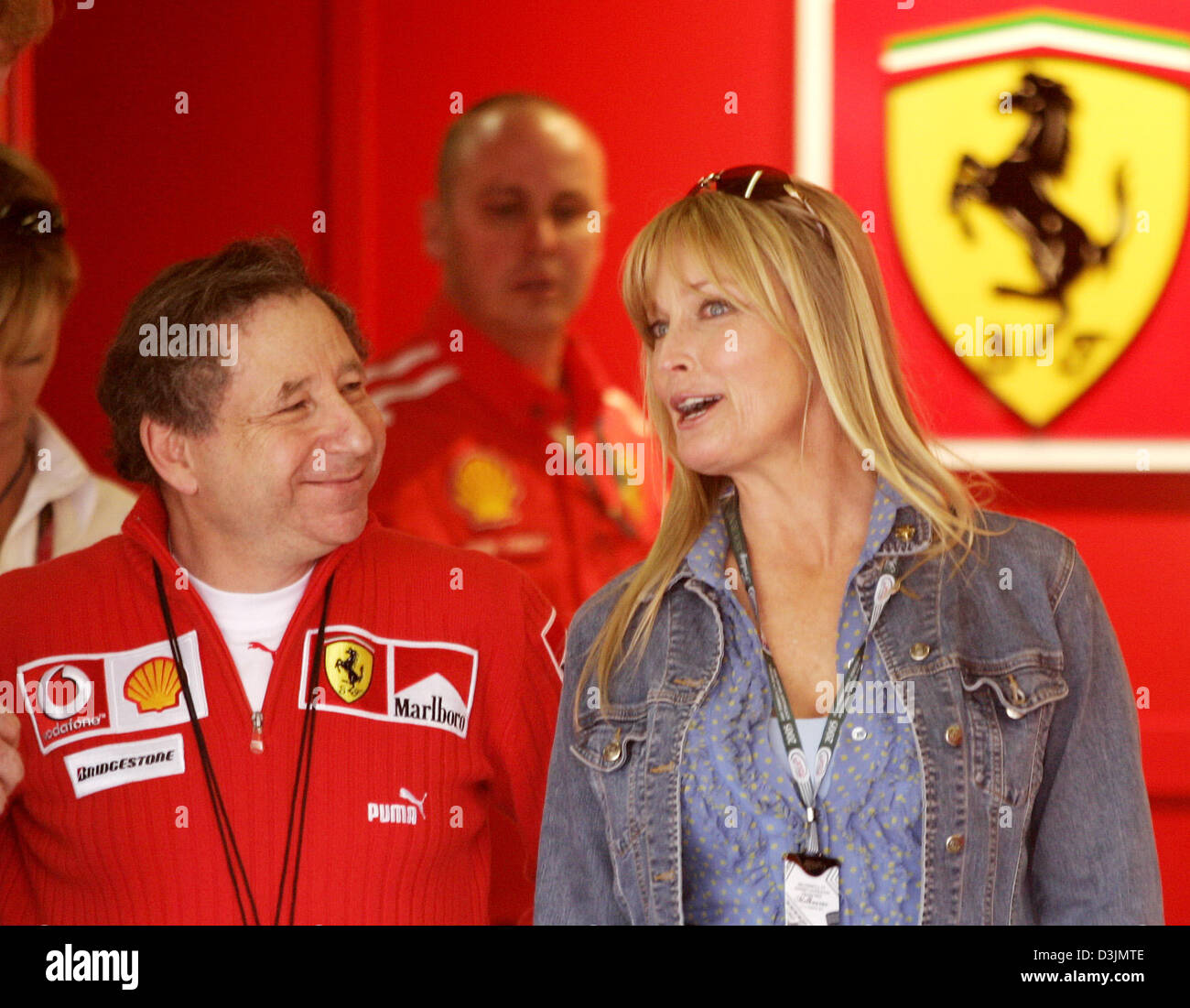 Jean Todt and US born actress Bo Derek talk in the pits at the Grand Prix Circuit in Melbourne, Australia, on 04 March 2005.