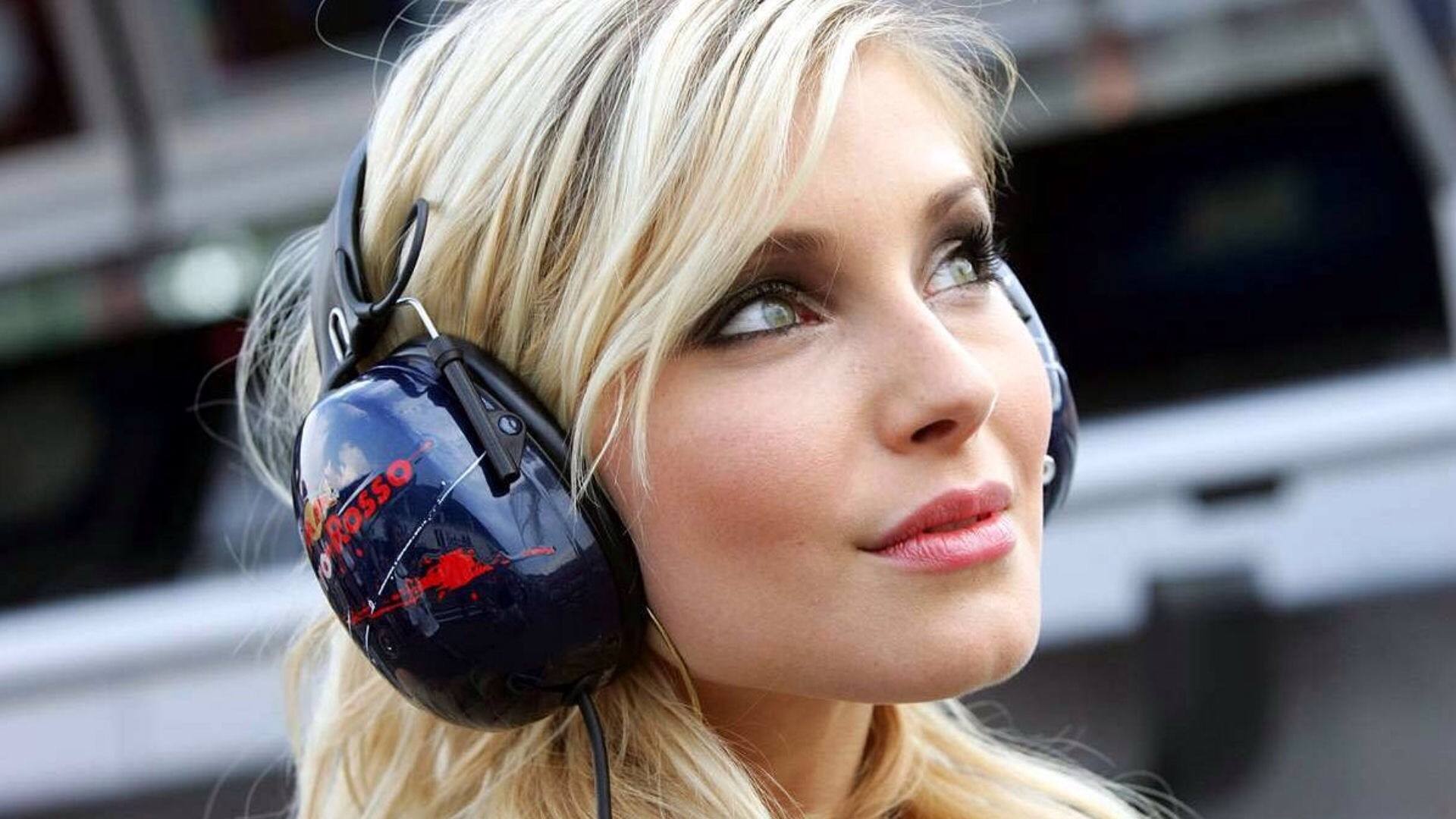 A girl in the Toro Rosso pits.