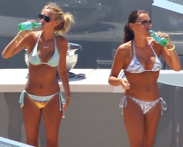Tamara and Petra Ecclestone in bikinis in 2011.