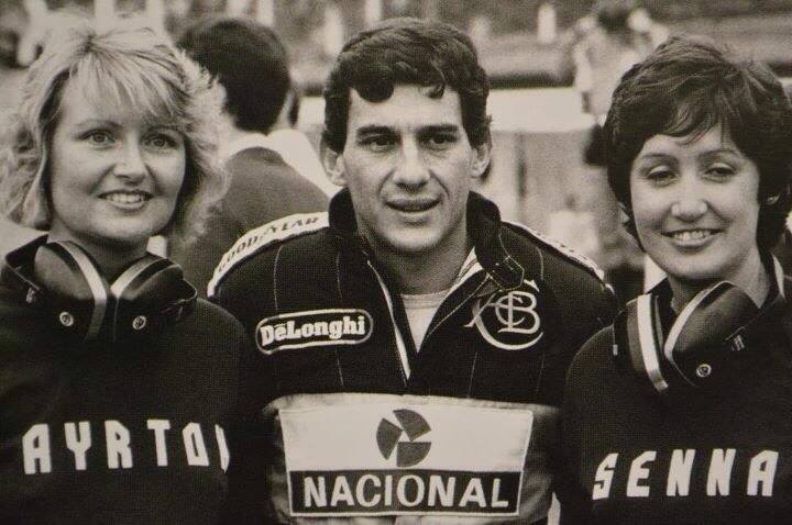 Ayrton Senna, Lotus, with two girls.