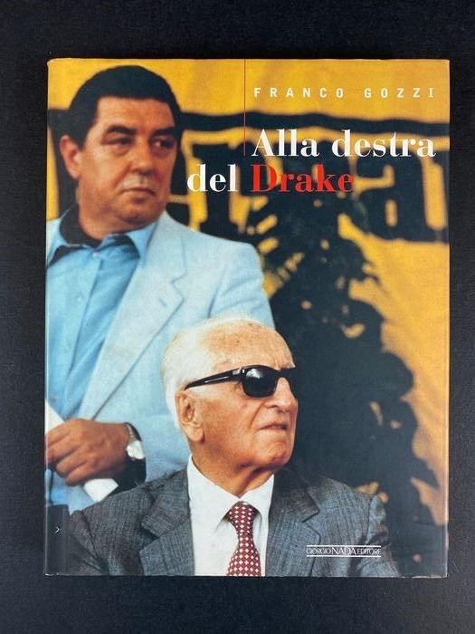 The cover of a magazine with Franco Gozzi and Enzo Ferrari.