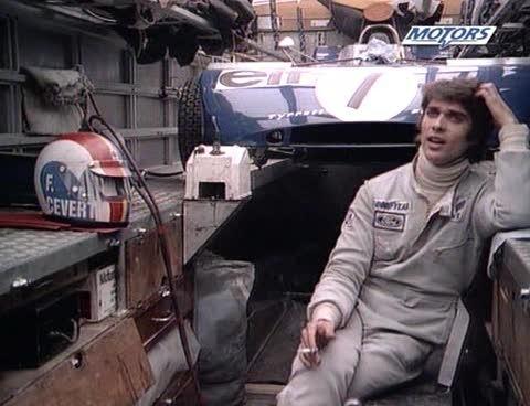 Francois Cevert strikes a philosophical pose in the Tyrrell transporter.