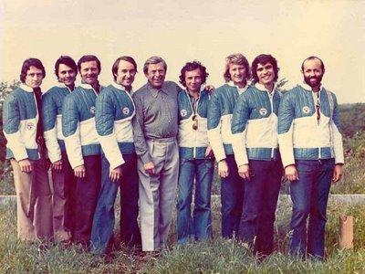 The 1973 Matra Le Mans team pose in a field, in matching anoraks. Left to right: Patrick Depailler, Bernard Fiorentino, Jean-Pierre Jaussaud, Gerard Larrousse, Marcel Chassagny, Jean-Pierre Beltoise, Jean-Pierre Jabouille, Francois Cevert and Henri Pescarolo. 
