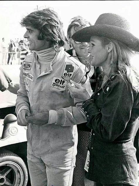 Francois Cevert and Ursula Andress at the Glen in 1972. Chris Economaki is between them!