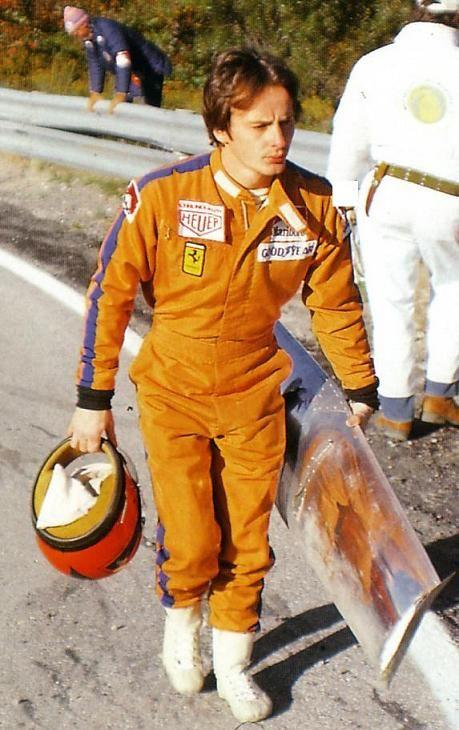 Photo of Gilles holding his racing helm