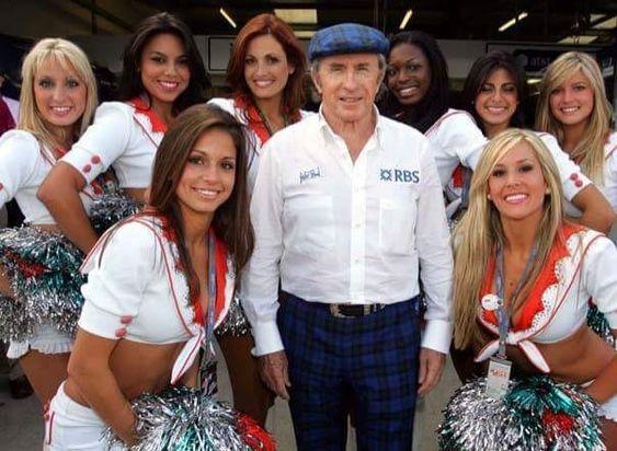 Picture of Jackie Stewart with girls