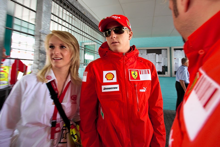 Kimi Raikkonen poses with an 'official' fan  at Hockenheim in July 2008. 