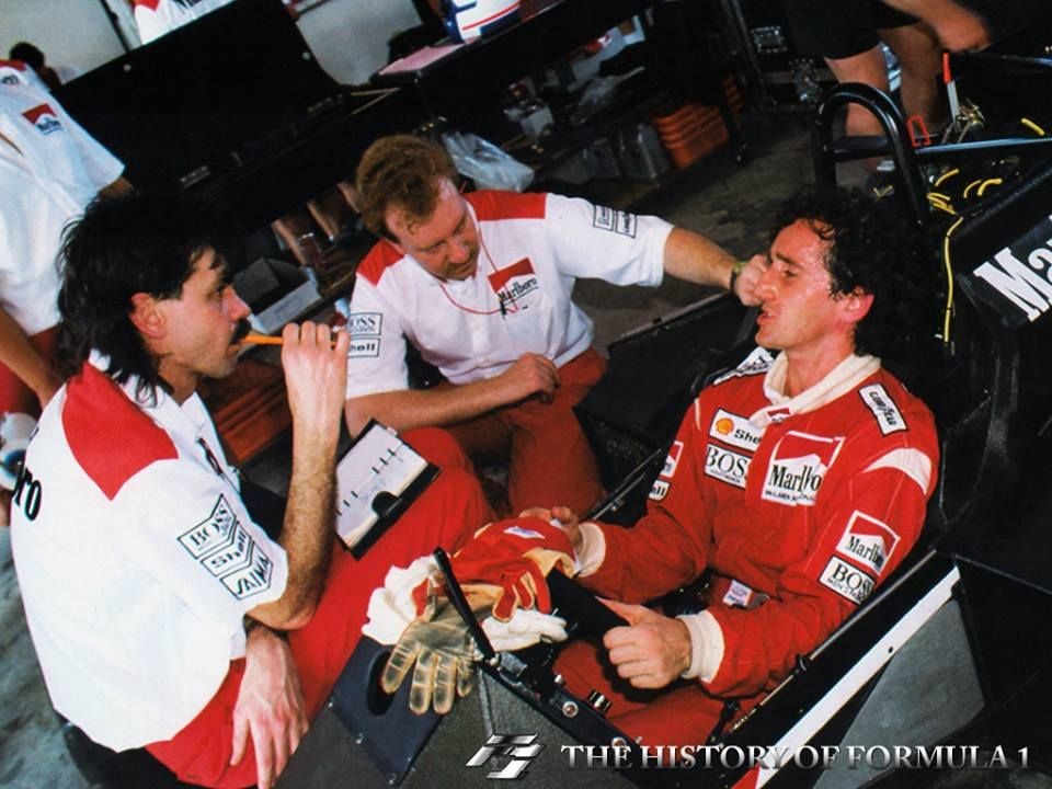 Alain Prost describes the behaviour of his McLaren with Gordon Murray (left) and engineer Neil Oatley. 