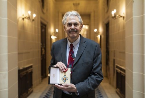F1 and road car design legend Gordon Murray receives CBE from Prince William.